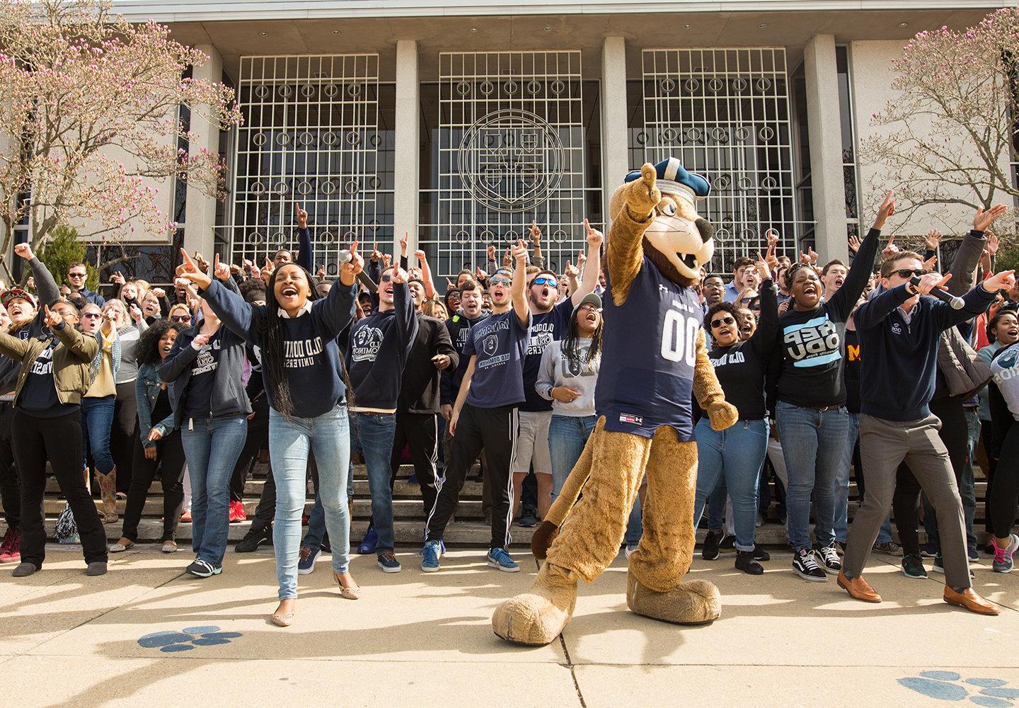 ODU students cheering with Big Blue mascot
