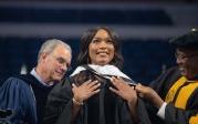 Award-winning actress Angela Bassett receives a Doctor of Humane Letters degree from Board of Visitors Rector Bruce Bradley and Provost Austin Agho. Photo Nicholas Clark/ODU