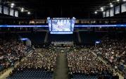 Photo of ODU students and their families gathered in a basketball arena for commencement.