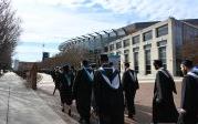 Graduates walk to Chartway Arena