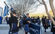 Bagpipers play as students enter Chartway