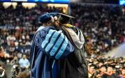 President Brian O. Hemphill, Ph.D., congratulates a student at Old Dominion University's commencement exercises on May 6at Chartway Arena. Photo Chuck Thomas/ODU